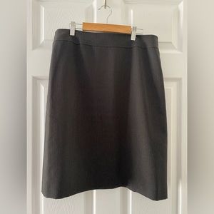 Knee length pinstripe black skirt